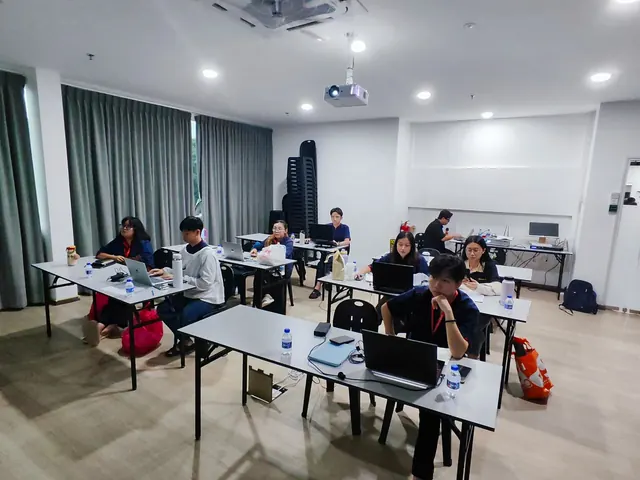 Participants working through exercises in a training room